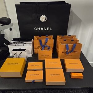 CHANEL And Louis Vuitton Boxes And Bags